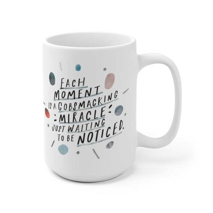 15 oz white coffee mug decorated with quote about mindfulness, designed with whimsical, abstract shapes.