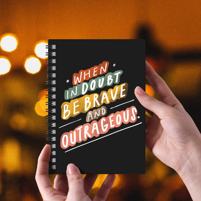 Motivating and colorful quote about being your truest self hand-lettered on a spiral black 6” x 8” notebook. 