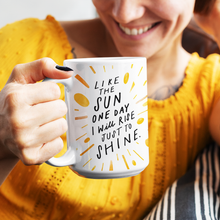 Load image into Gallery viewer, Trendy woman with yellow shirt holding a gorgeous white 15oz coffee mug with an uplifting quote on it about life.
